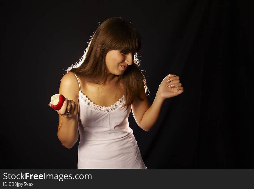 Healthy woman posing with apple. Healthy woman posing with apple