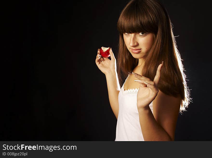 Healthy woman posing with apple. Healthy woman posing with apple