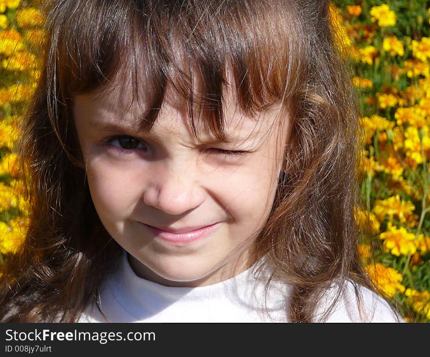 The little girl looks having blinked the eyes. The little girl looks having blinked the eyes