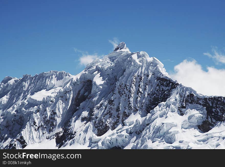 View Jancarurish peak in the Cordilleras mountain. View Jancarurish peak in the Cordilleras mountain