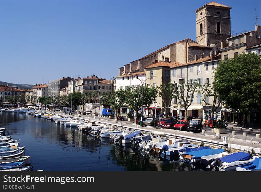 La Ciotat old port showing fisher and other small boats and antique church, french riviera, europe