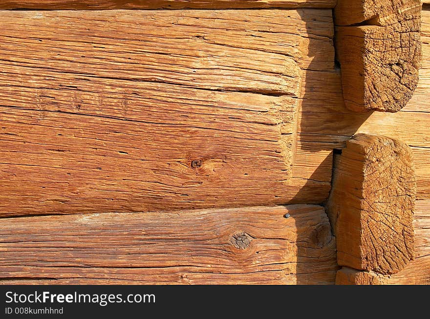 Aged logs in the wall. Aged logs in the wall