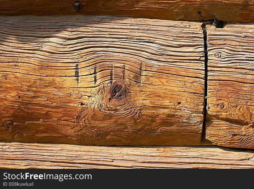 Aged logs in the wall. Aged logs in the wall