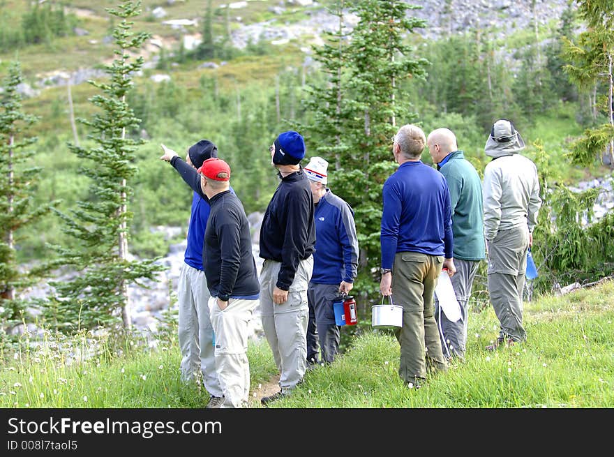 Hikers looking up Mt Rainier