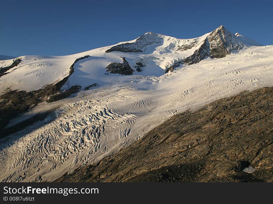 High mountain and glacier with cracks