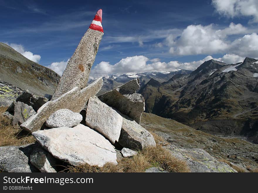 Sharp stone with tourist sign. Sharp stone with tourist sign