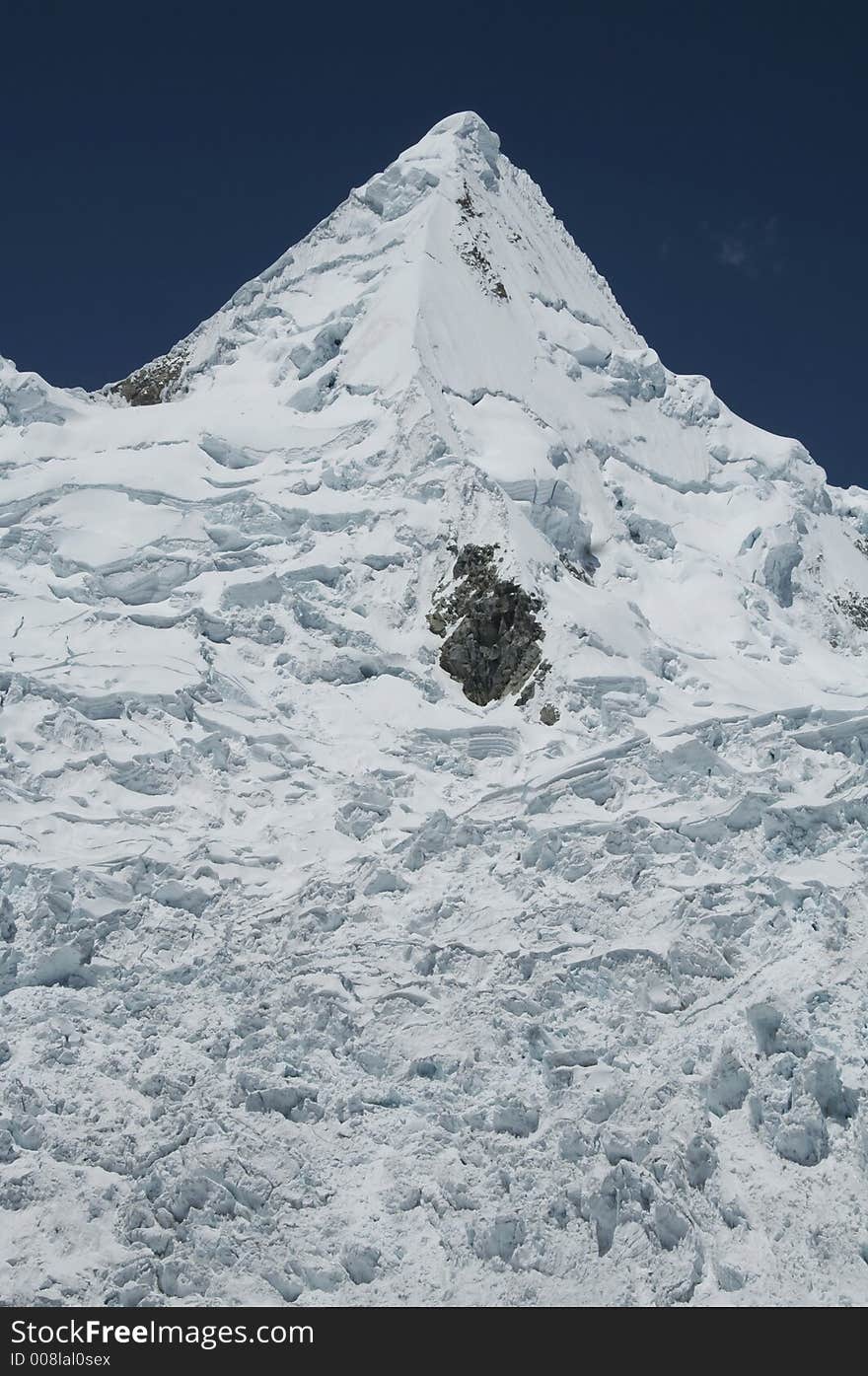 Snowy peak Alpamayo in Cordilleras. Snowy peak Alpamayo in Cordilleras