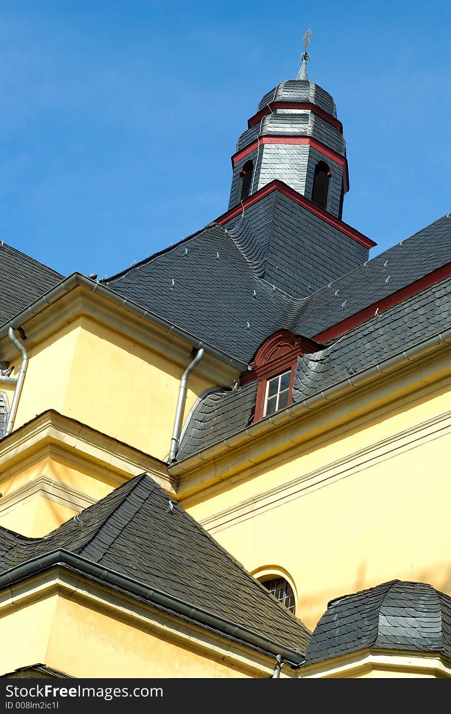 Old church detail shot against blue sky