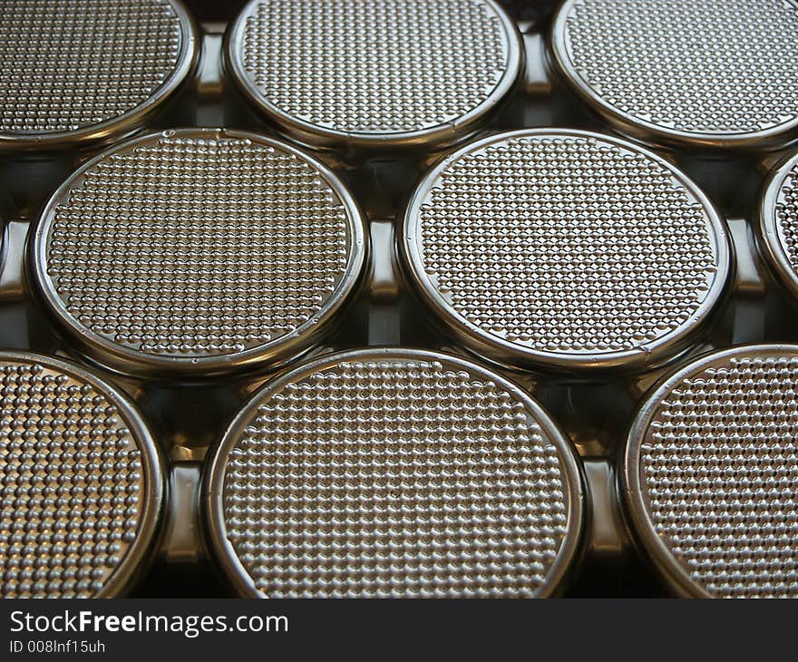 Round metal windows on a spacecraft