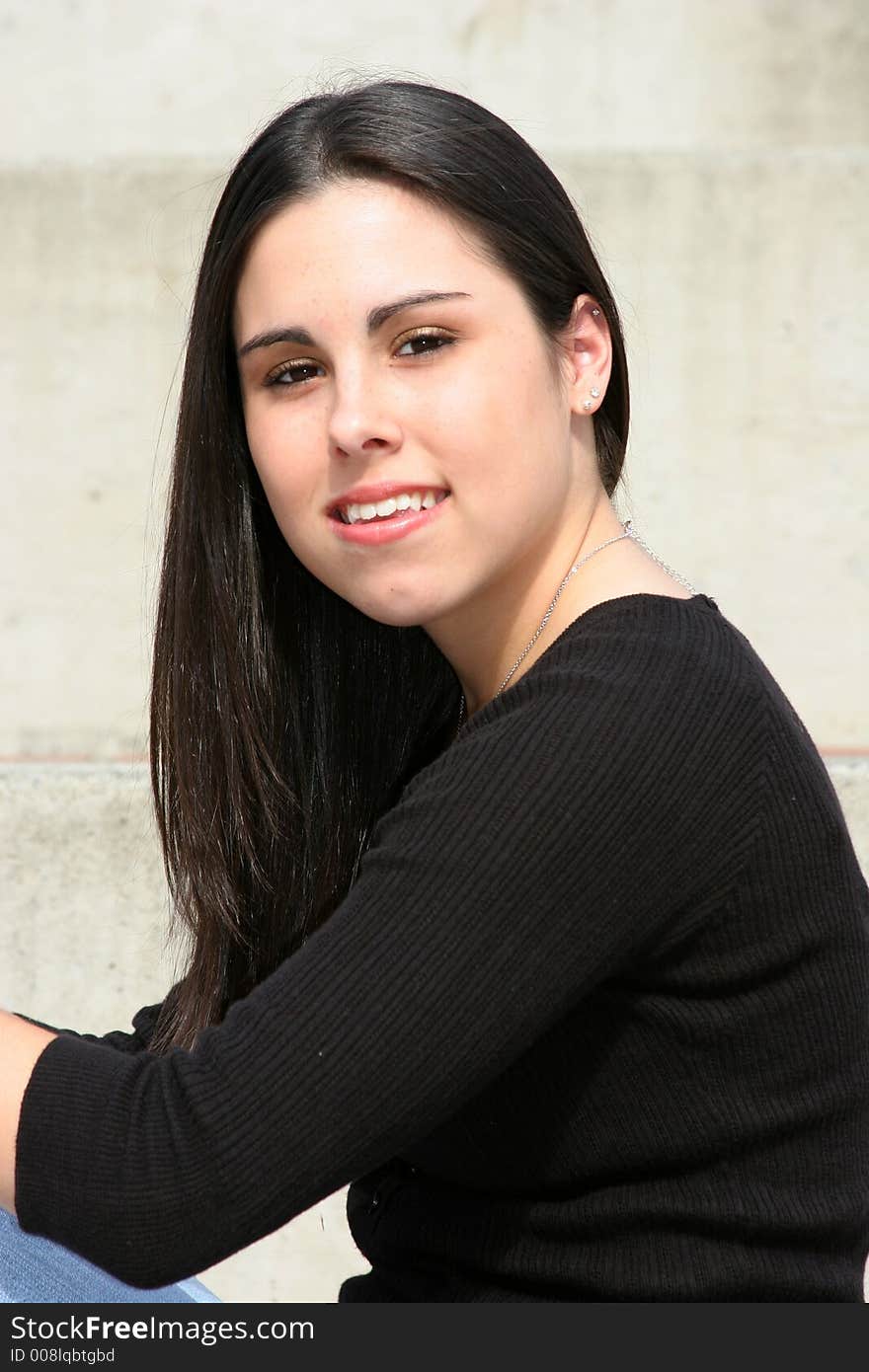 A very pretty teenage girl modeling for a photo shoot. A very pretty teenage girl modeling for a photo shoot.