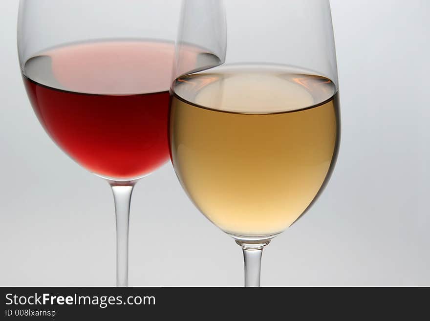 Wineglasses with wine on the table