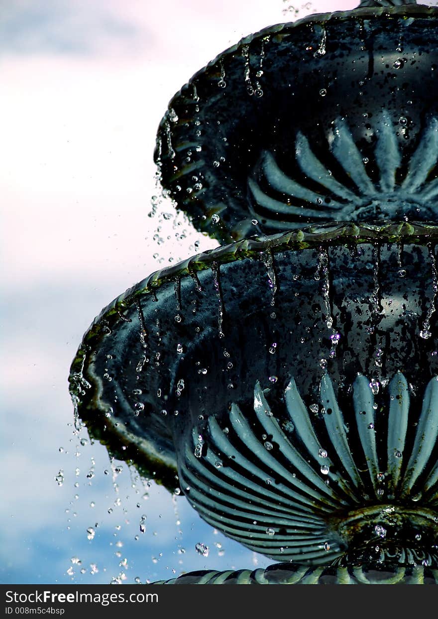 Closeup detail of fountain againt sky. Closeup detail of fountain againt sky