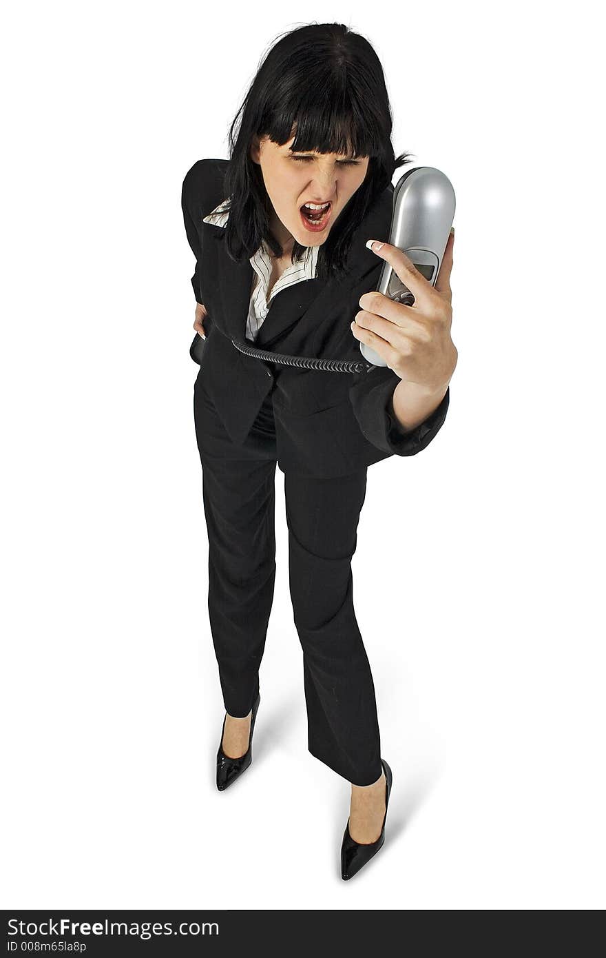 Young business woman yelling into phone. Full body over white. Young business woman yelling into phone. Full body over white.