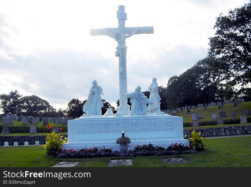 Jesus dead on the Crucifix. This statue was located in a Catholic Cemetery. Jesus dead on the Crucifix. This statue was located in a Catholic Cemetery.