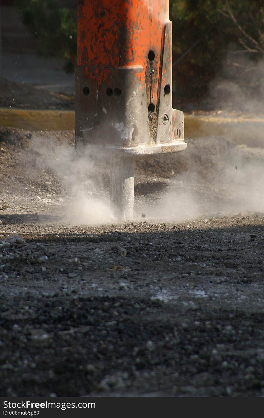 Hydraulic heavy-duty construction punch used to break up roadways.