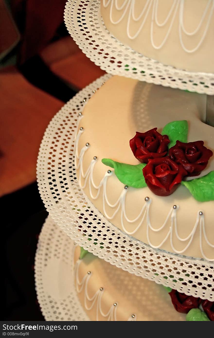 Wedding cake with red roses