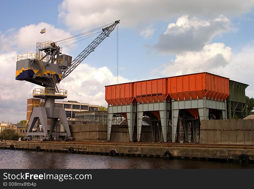 Large crane for loading ships on a canal. Large crane for loading ships on a canal