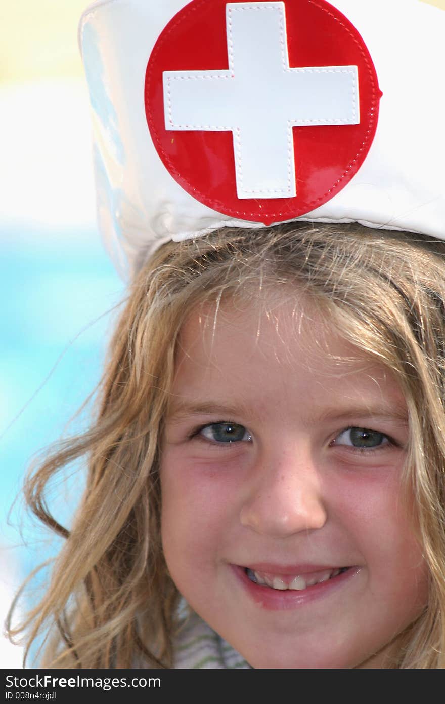 Cute little girl playing nurse