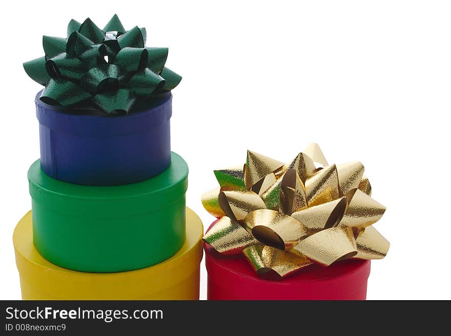 Assorted stacked gift boxes and ribbons isolated. Assorted stacked gift boxes and ribbons isolated