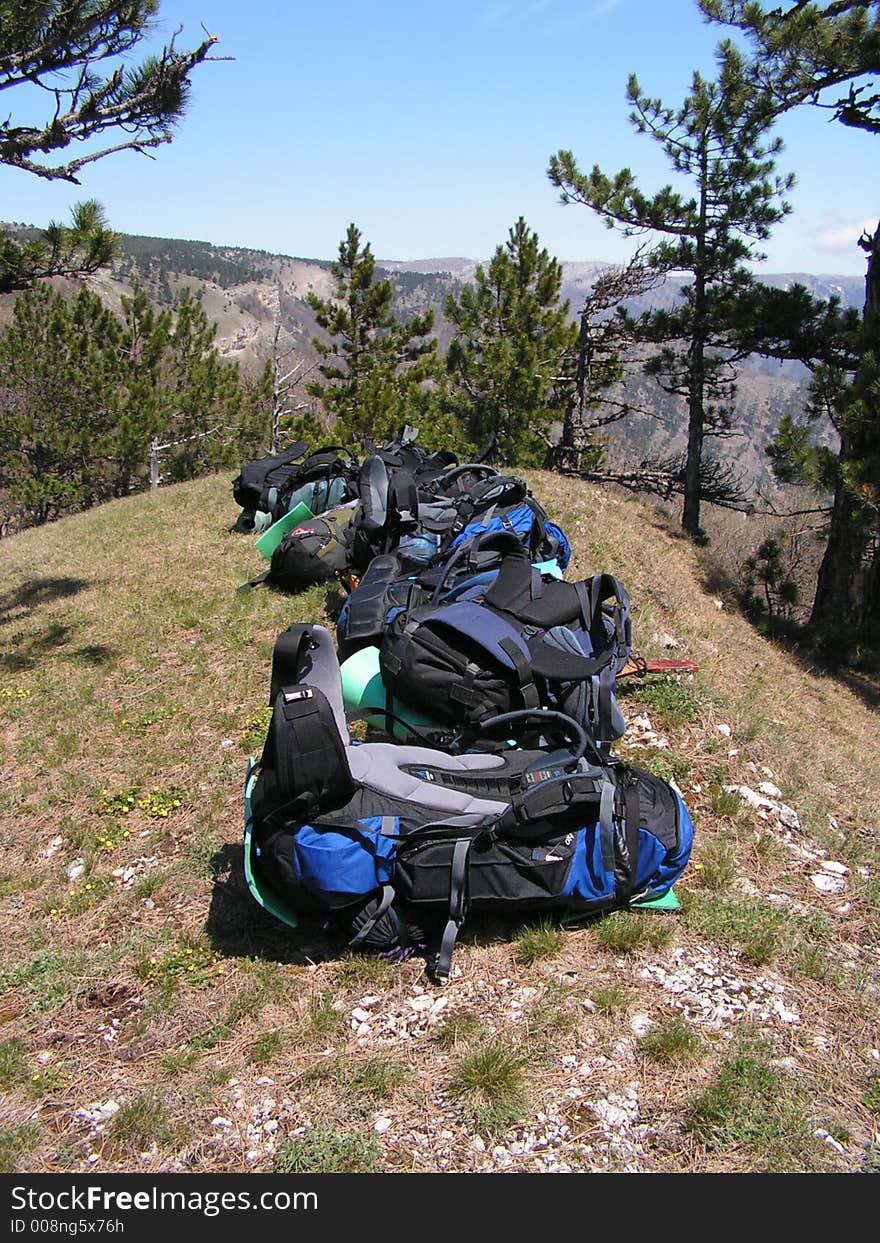 A few knapsacks that lay out on the top of mountain (Crimea)