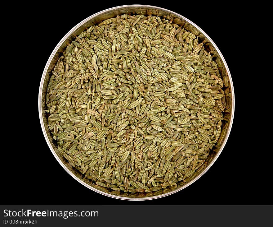 A selection of cooking spices on a plain background