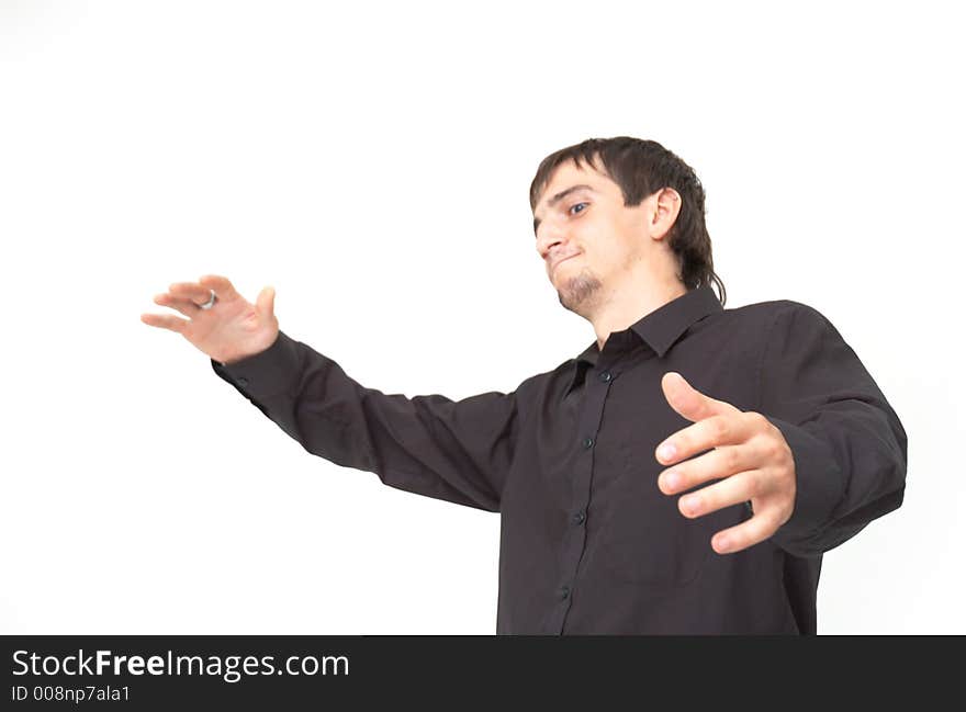 Young boy wearing a black shirt gesturing; isolated on white. Young boy wearing a black shirt gesturing; isolated on white