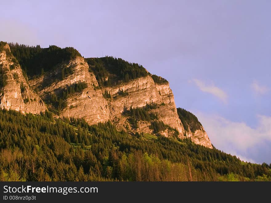 Low Evening Sunlight On The Pic De Memise, In The French Alps, M