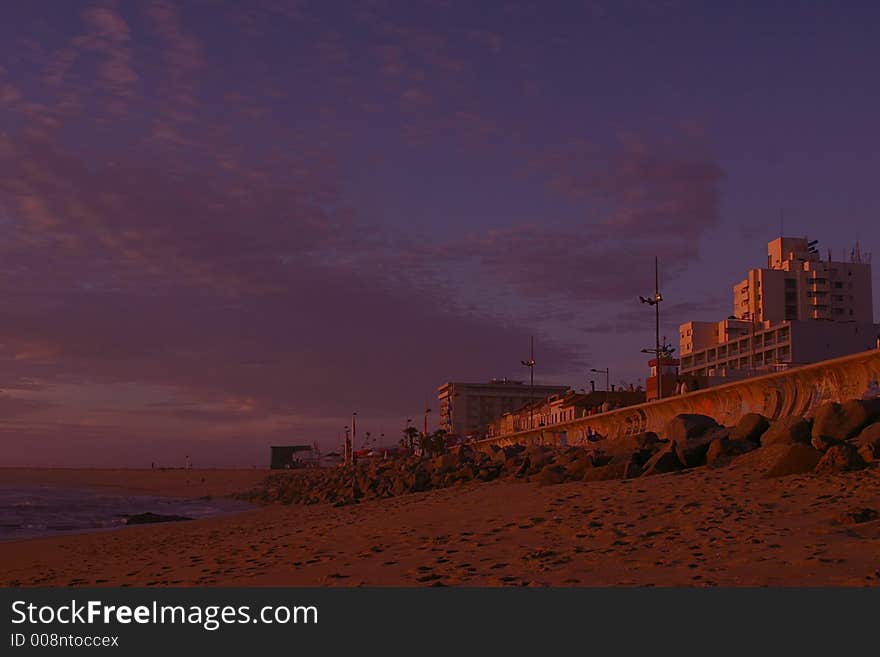 Sunset in a beach near the city