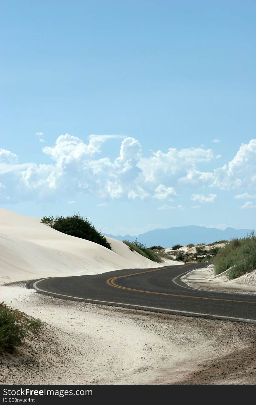 Desert highway in white sand dunes. Desert highway in white sand dunes