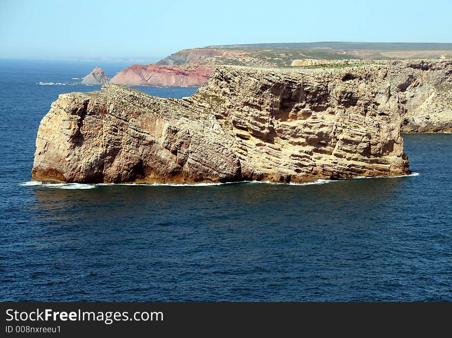 A huge rock in the atlantic ocean at the western coastline of portugal - looks like a shoe. A huge rock in the atlantic ocean at the western coastline of portugal - looks like a shoe...