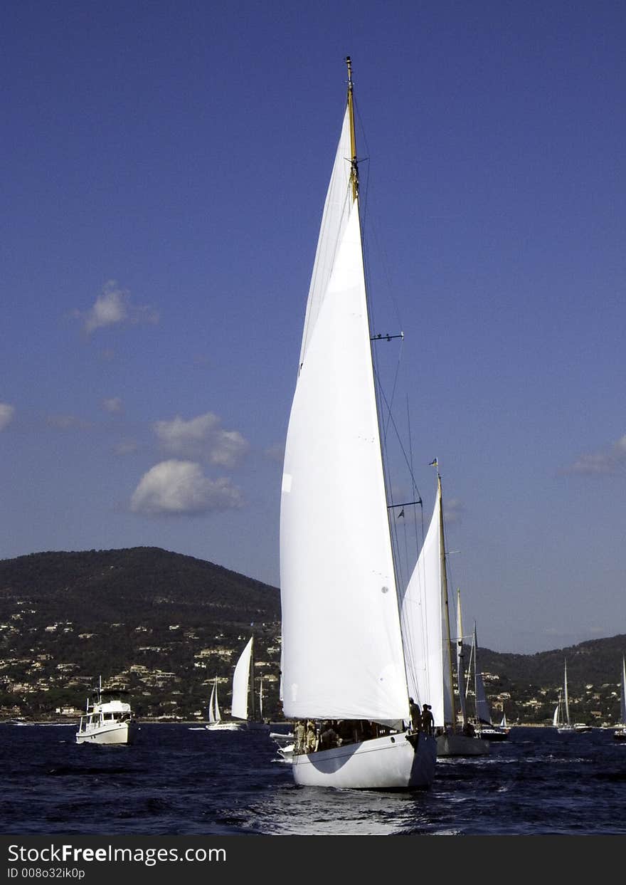 Classic sailing yawl Mariella from 1938 by Fife putting up sails