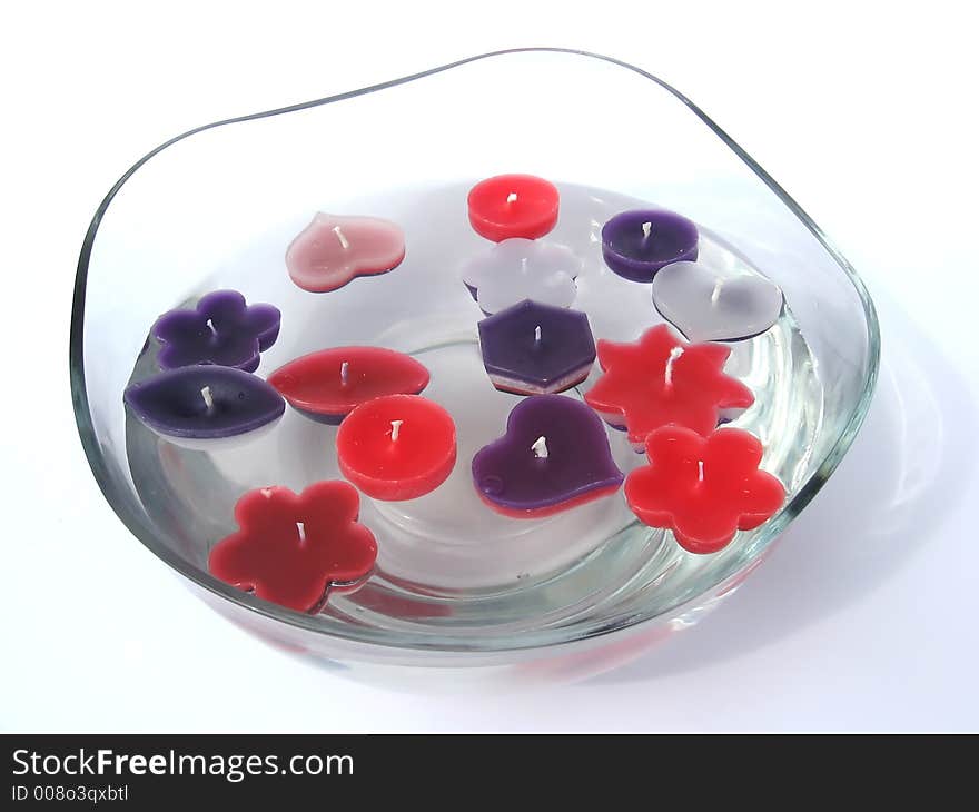 Floating candles in a bowl with water