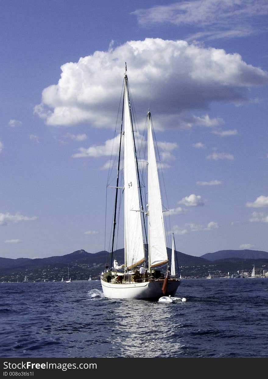 Classic sailing yacht Tamory motoring into the bay of St-Tropez