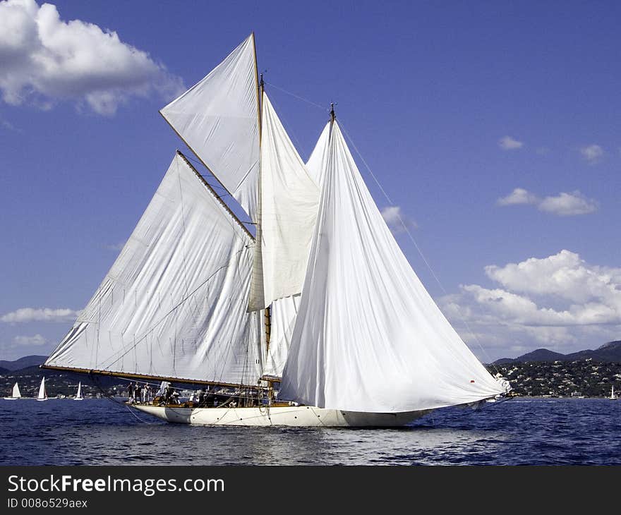 Classic sailing yacht Lulworth of 1920 with all sails out, awaiting he wind