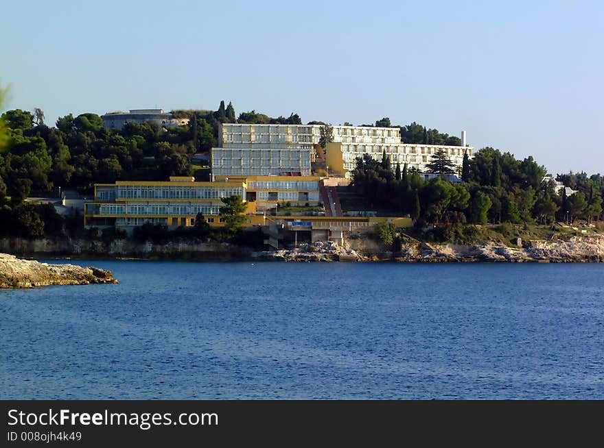 Hotel on a rocky cliff overlooking the sea