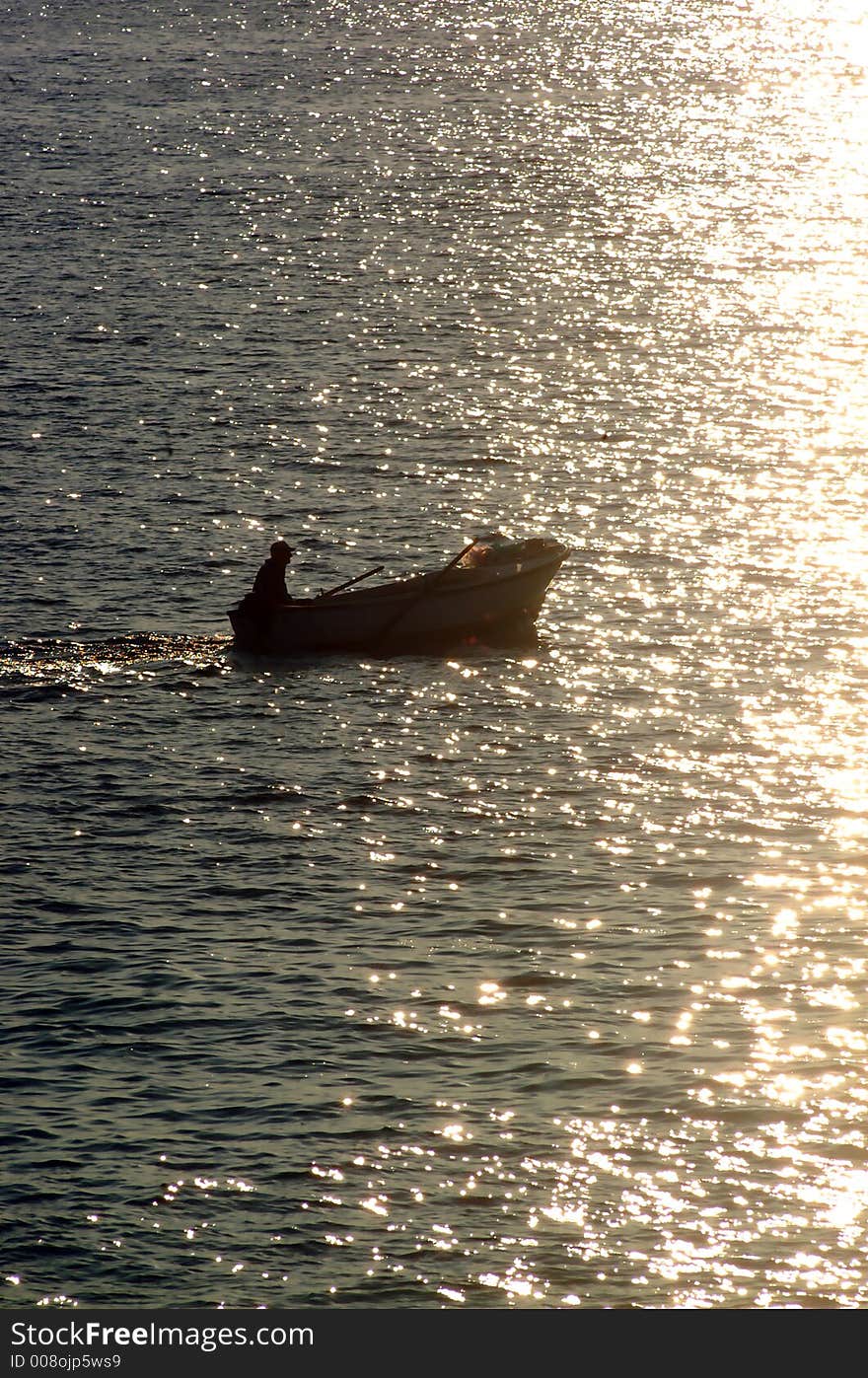 Fisherman on a small boat. Fisherman on a small boat