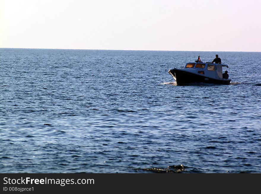 Fisherman on a small boat. Fisherman on a small boat