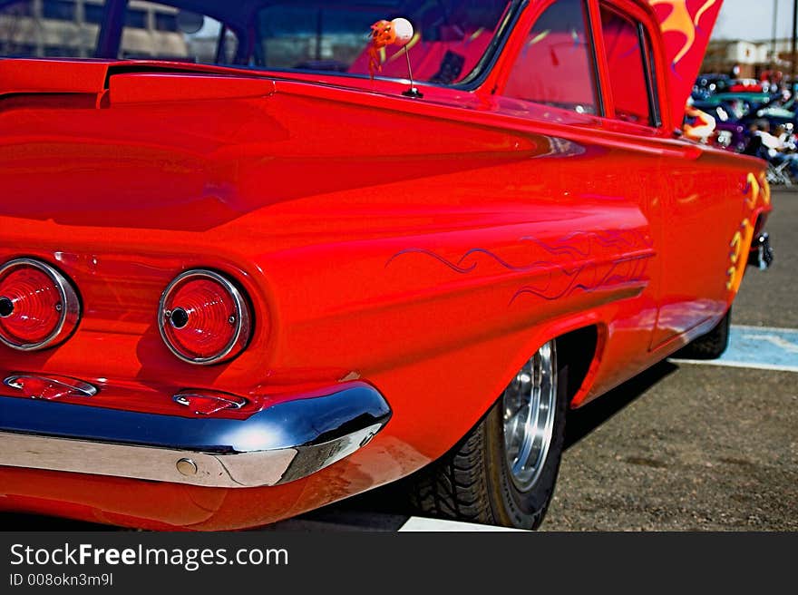 Classic Red 60s Chevy with tail lamps