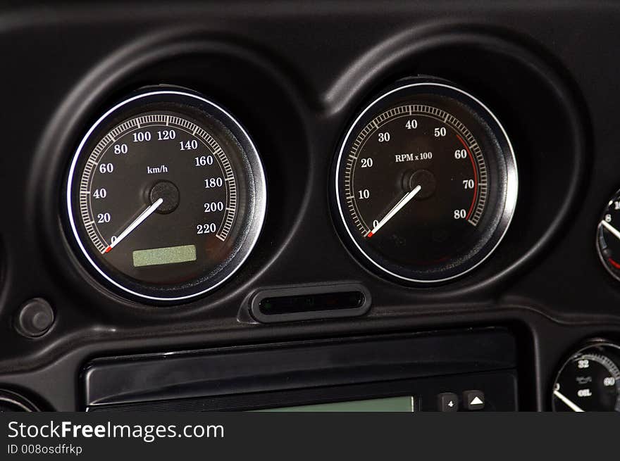 Close-up of two dials on motorcycle