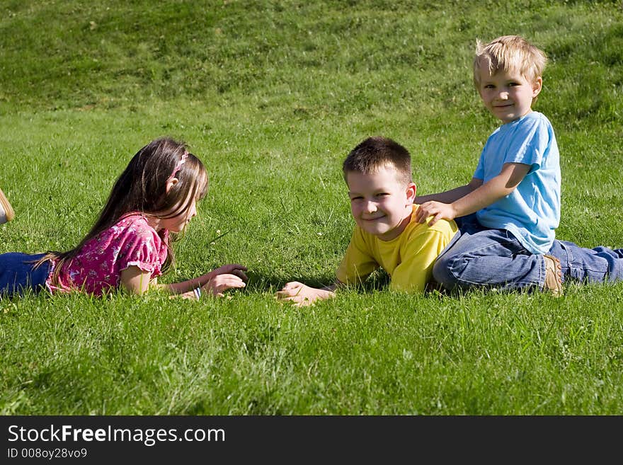 Children on a green meadow. Children on a green meadow