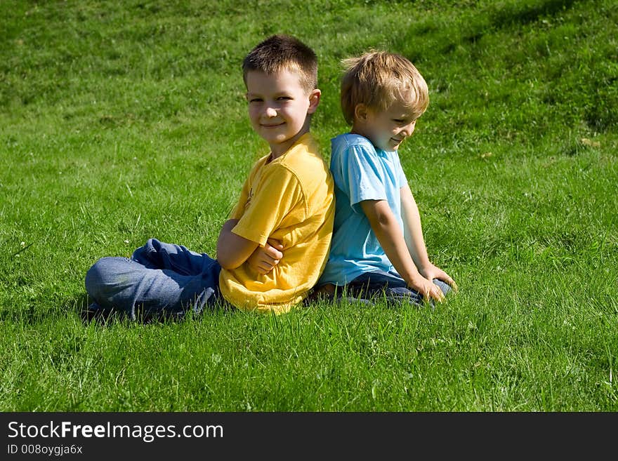 Brothers resting on a meadow. Brothers resting on a meadow