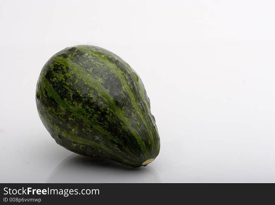 A brightly colored pumpkin squash