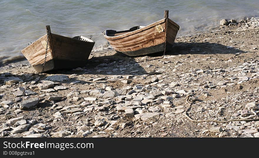 Two boats at the lake's beach. Two boats at the lake's beach