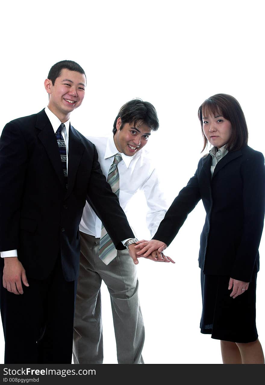 Young asian and american co-workers look into the camera. Young asian and american co-workers look into the camera