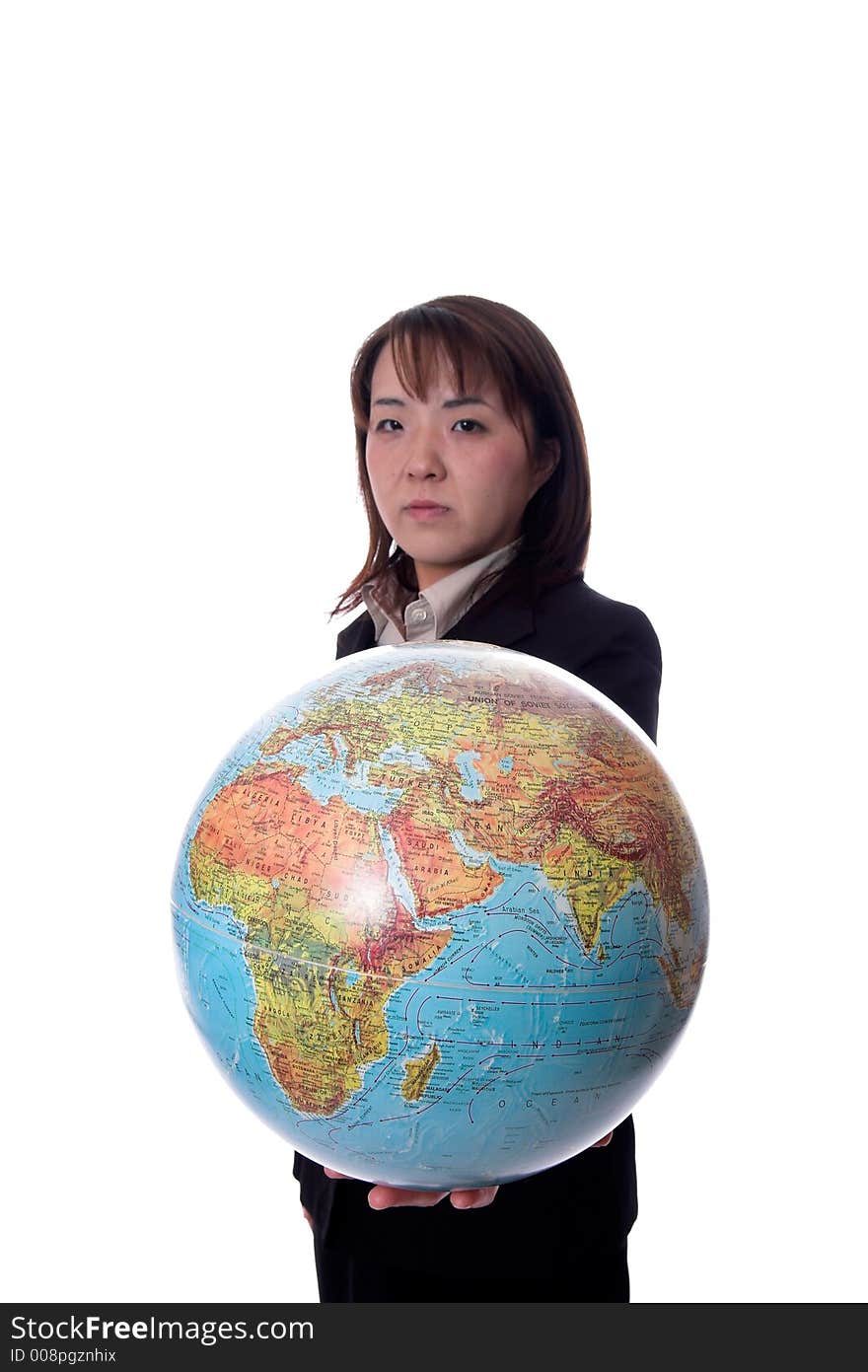 Young asian businesswomen holding a globe. Young asian businesswomen holding a globe