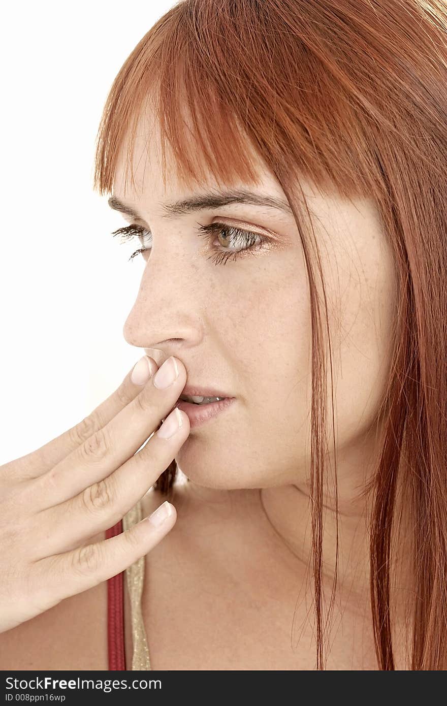 Red-haired young girl, woman with  a fringe covering her lips. Red-haired young girl, woman with  a fringe covering her lips