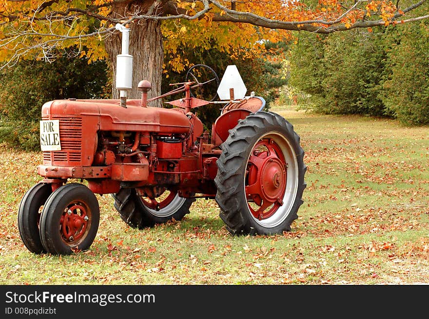 Antique tractor in rural setting