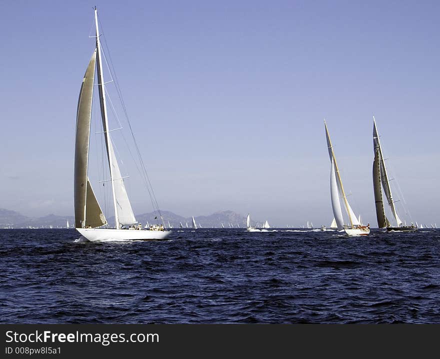 Modern sailing yachts competing in the Voils de St-Tropez. Modern sailing yachts competing in the Voils de St-Tropez