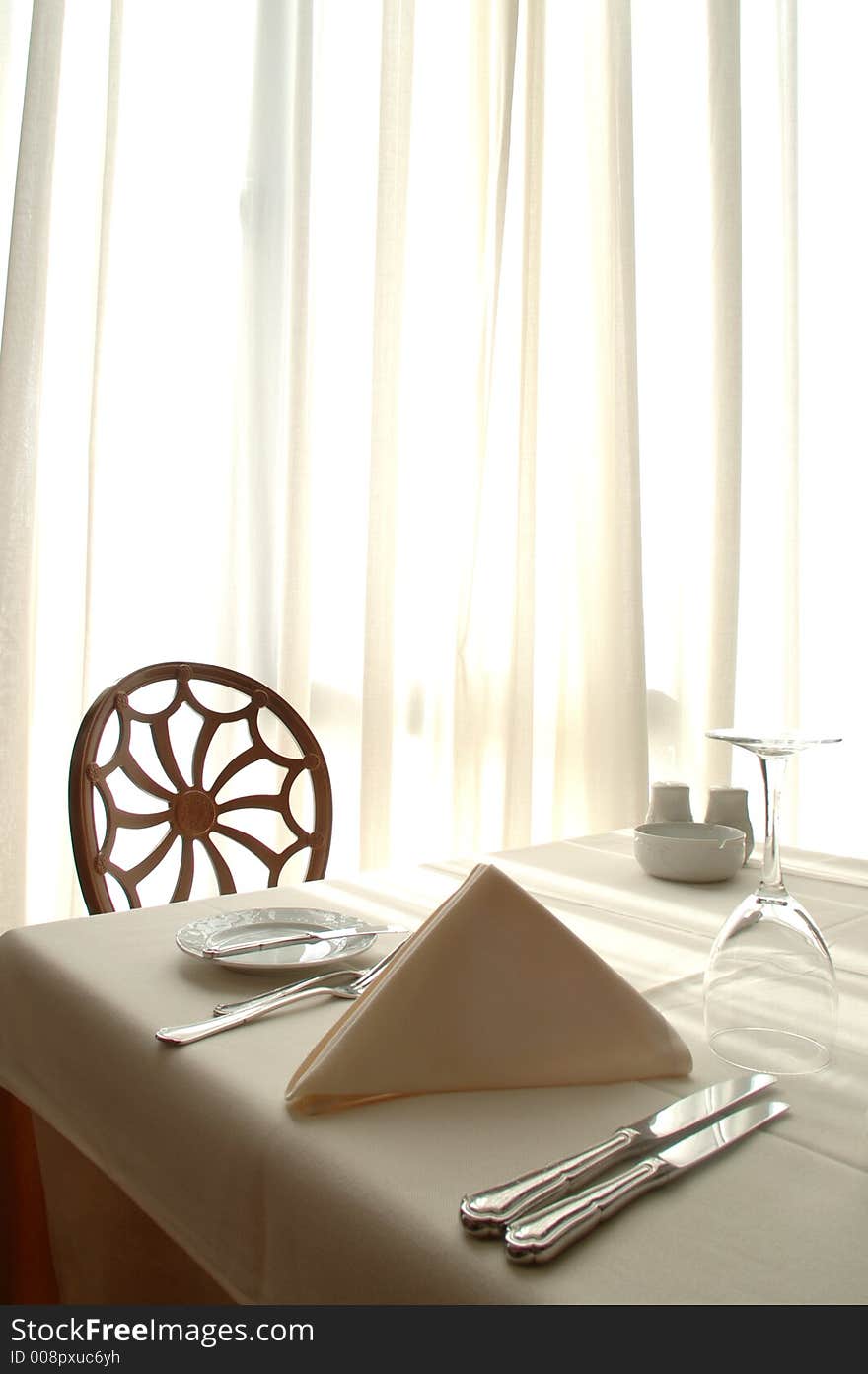 View of a chair at a restaurant. View of a chair at a restaurant