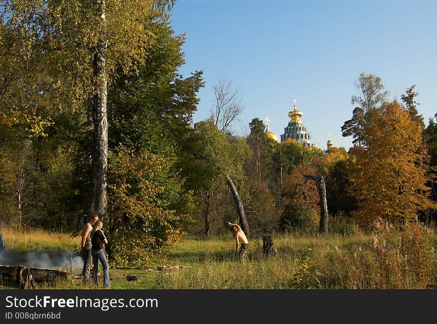 People and snags near church in New Jerusalem near Istra, Moscow region, Russia